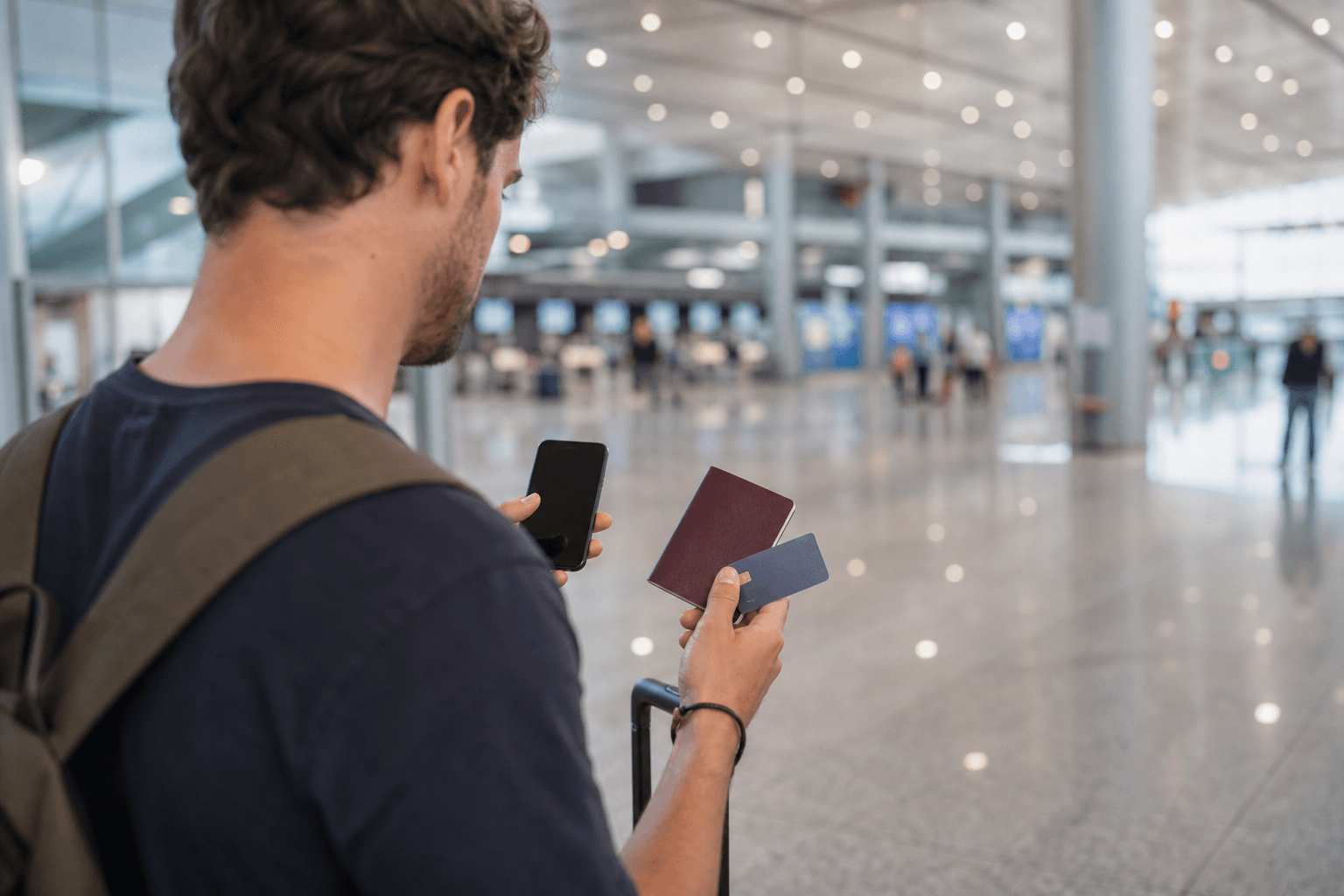 Airport arrival payment setup with passport, phone, and bank card