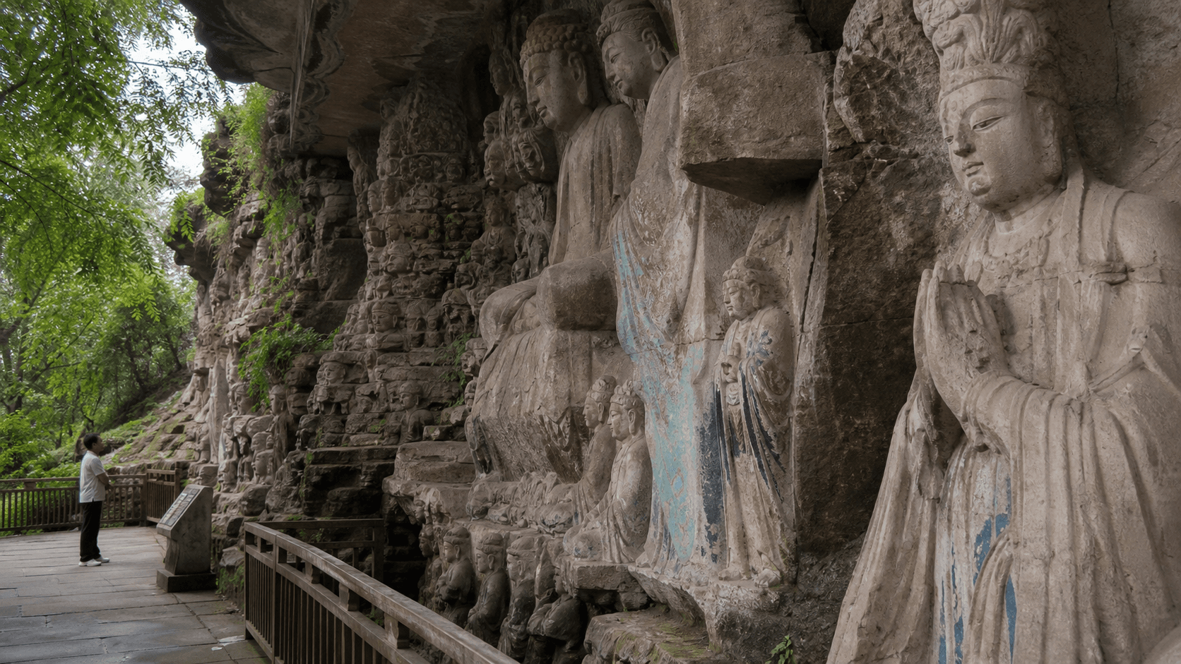 Closer side view of a quiet Beishan-style cliff path and finely detailed reliefs