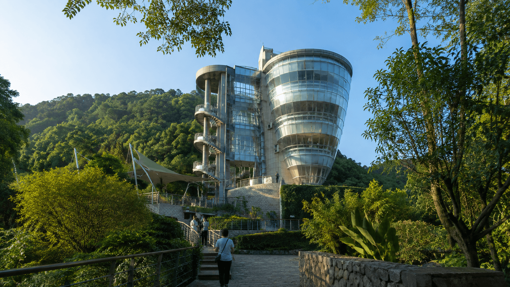 Late-afternoon approach to the curved Nanshan One Tree viewing pavilion